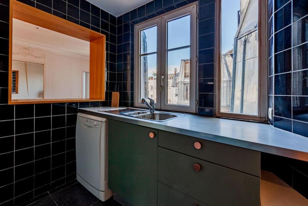 Charmant Appartement Au Coeur De Parigi Esterno foto
